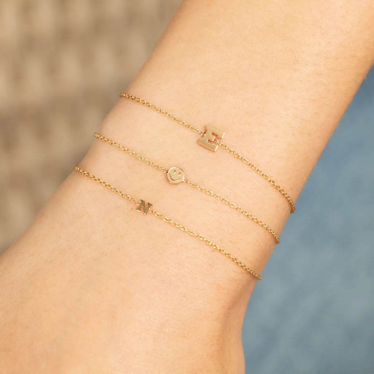 14k Itty Bitty Smiley Face Bracelet