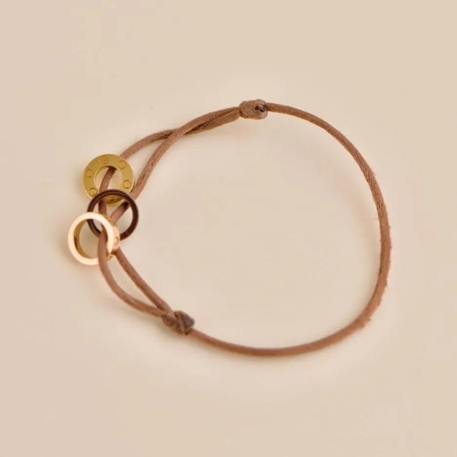 Cartier Love 18k Yellow and Rose 4 Diamond Sevres Porcelain Brown Cord Bracelet