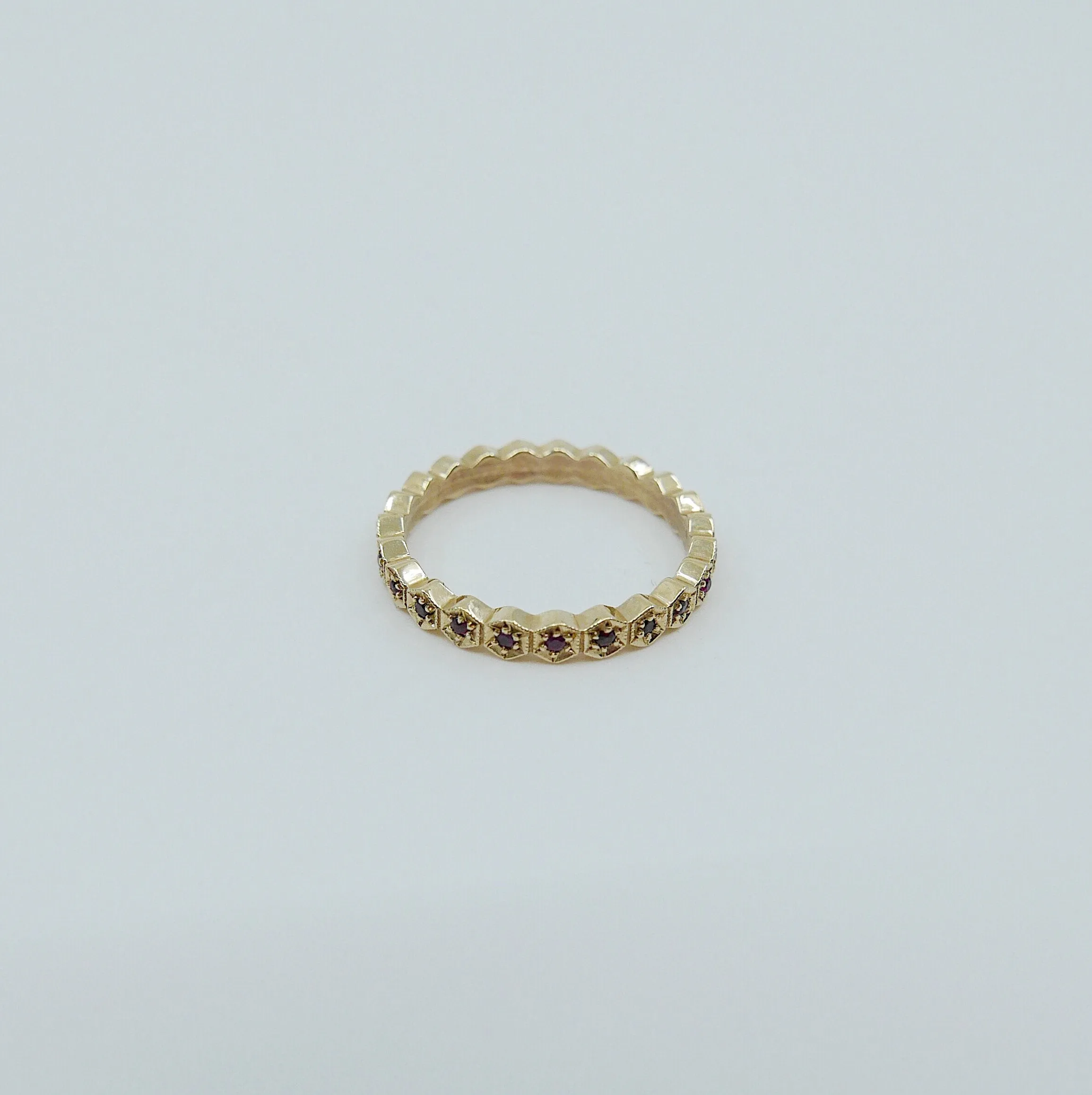 Hexagon Ruby Eternity Band